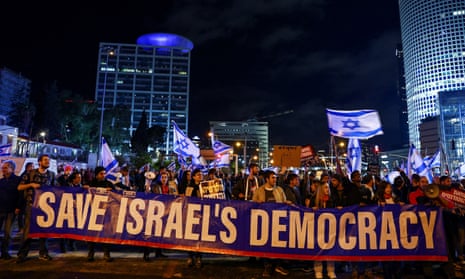Israelis in Tel Aviv protest against Netanyahu's far-right coalition and its proposed judicial reforms to reduce the powers of the supreme court.
