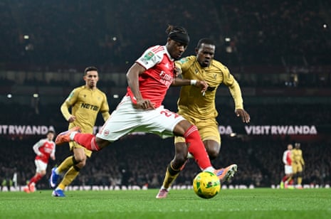 Noni Madueke is put under pressure by Tyrick Mitchell.