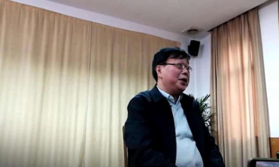 A still from the video in which Gui Minhai delivers his staged confession