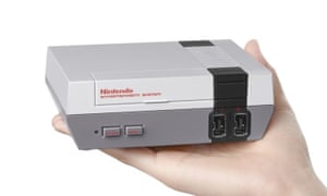 Mini NES held in palm of hand