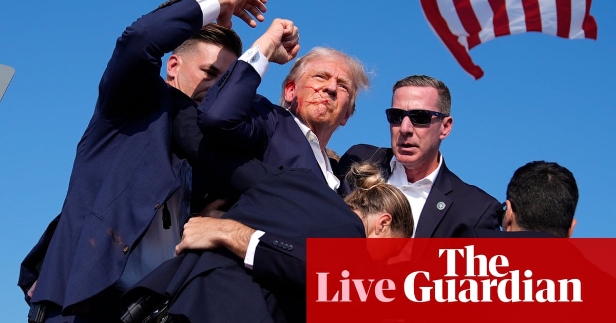 Donald Trump is ‘fine’ after being rushed off stage at rally amid possible gunshots - latest updates