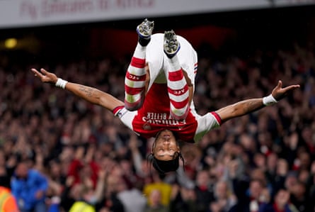 Pierre-Emerick Aubameyang does a somersault after scoring for Arsenal.