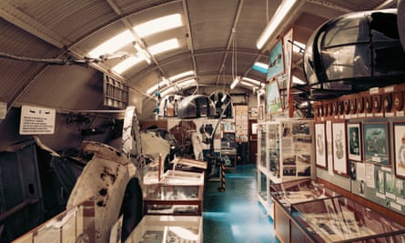 Parts of planes and memorabilia inside a tin hangar