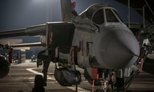 Ministry of Defence handout photo of a RAF Tornado sitting on the pan at RAF Akrotiri in Cyprus, armed with two Storm Shadows missiles before taking-off on a sortie