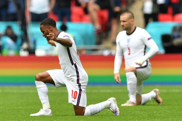 Raheem Sterling and Luke Shaw take the knee before England v Germany at Euro 2020