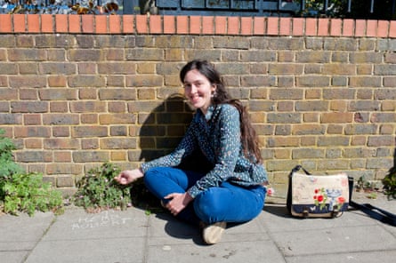 Sophie Leguil, founder of ‘more than weeds’, who chalks plant names on pavements in Hackney.