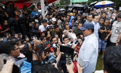 Indonesian presidential candidate Prabowo Subianto  meets members of the media after casting his vote, 14 February 2024. 