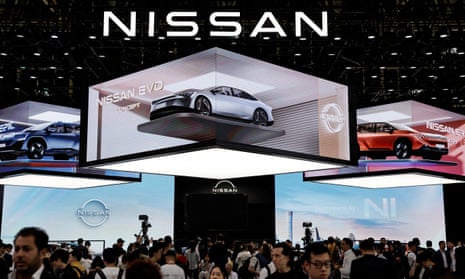 Nissan cars are displayed overhead at the carmakers’s booth at the Beijing International Automotive Exhibition, or Auto China 2024
