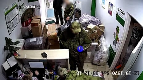 Footage appears to show Russian troops sending home items looted from Ukraine – video
