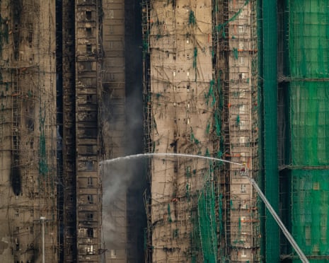 Firefighters continue work to extinguish the fire on Thursday