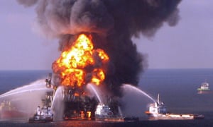 In this file photo which the US Coast Guard  released on April 22, 2010, shows fire boat response crews as they battle the blazing remnants of the oil rig Deepwater Horizon April 21, 2010. - Ten years after the oil spill which "shook BP to its foundations", in the words of its new boss Bernard Looney, the oil giant BP is faced with two existential threats: the collapse of prices and climate change. (Photo by -/US Coast Guard/AFP via Getty Images)