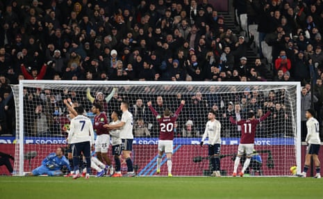 Jarrod Bowen celebrates the opening goal scored by Tomas Soucek (out of shot).