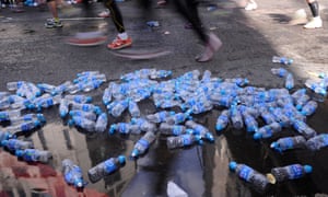Masses of discarded water bottles during the London Marathon.