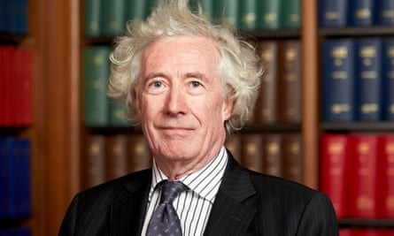 Jonathan Sumption in front of a bookcase