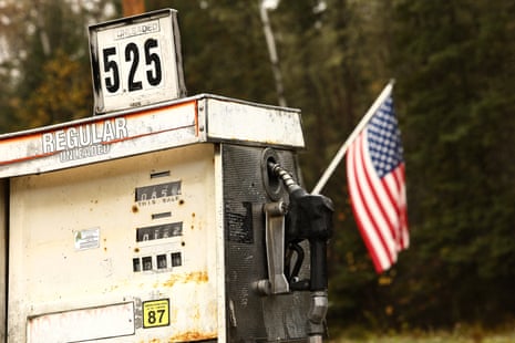 A US flag hangs at a gas station