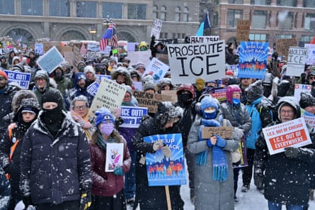 people holding signs