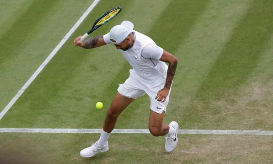 Nick Kyrgios prepares to play a between-the-legs shot at Wimbledon.