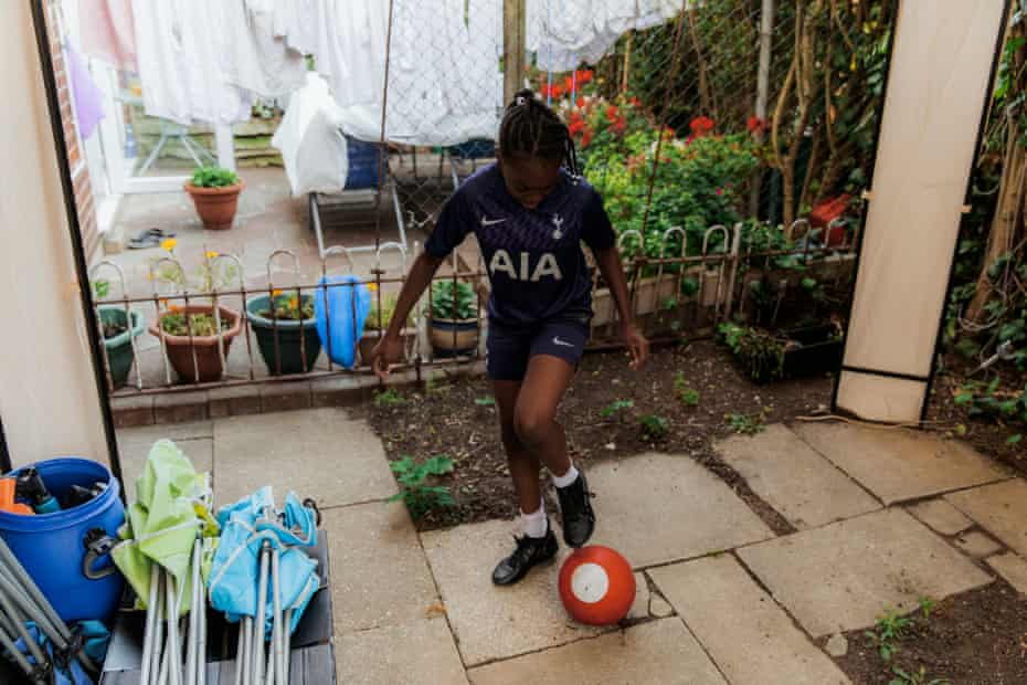T’shaya Francis-Gordon kicks a football in the garden