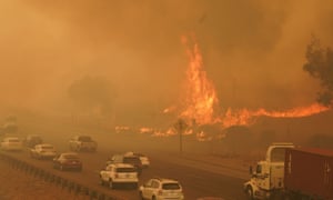 Traffic heading south on I-80 to escape the wildfires slows to a crawl at Vacaville on Wednesday. The fire jumped the freeway and advanced to Fairfield.