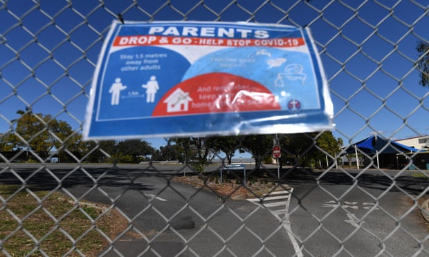 A sign advises of Covid hygiene practices on a locked gate at the entrance to a school in Logan, south of Brisbane, last year.