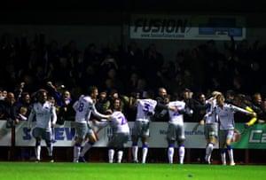 Colchester United celebrate Luke Gambin’s third goal.