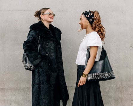 Two women model Charles and Keith line