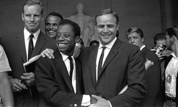 ‘Baldwin discovered the cinema before he discovered books’ … the writer with Marlon Brando (centre) at the Lincoln Memorial in 1963, with Charlton Heston (left) and Harry Belafonte (behind).