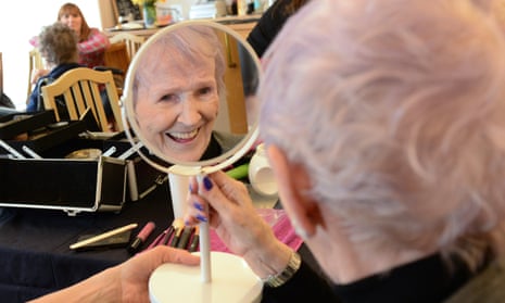 A resident of Albert Edward Prince of Wales Court care home enjoys a makeup session by Beautiful You.