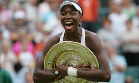A jubilant Venus Williams celebrates with the Wimbledon trophy in 2005