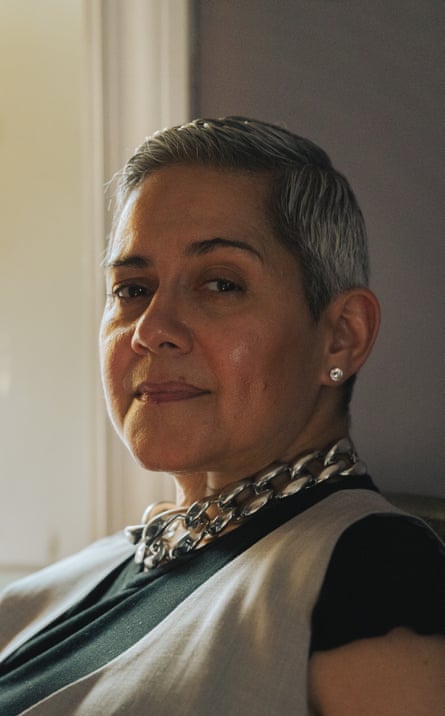 A middle-aged woman with short hair.