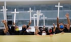 Bolsonaro uses Brazil's dictatorship-era law as protesters depict him as a Nazi