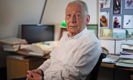 Frank Field seated in front of a desk