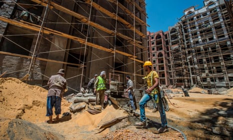 Labourers work at the construction site of the new Egyptian administrative capital, 40km east of Cairo.