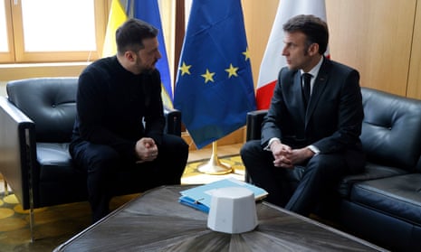 Ukraine's President Volodymyr Zelenskyy, left, meets French President Emmanuel Macron on the sidelines of the European Council to discuss continued support for Ukraine and European defence.