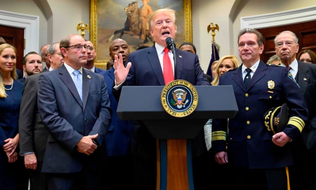 Donald Trump speaks about the First Step Act at the White House on 14 November.