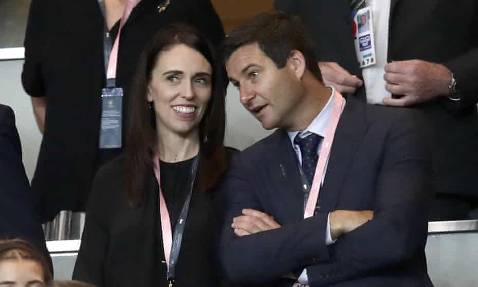 New Zealand Prime Minister Jacinda Ardern, left, with her partner Clarke Gayford, watching rugby in 2019. 