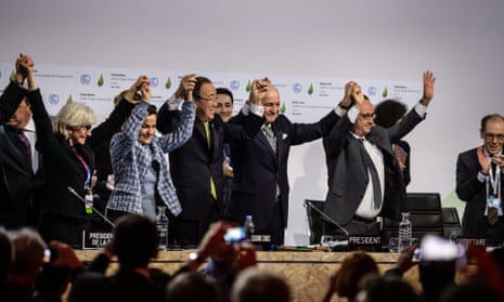Jubilation after the adoption of the Paris agreement in Paris on 12 December.