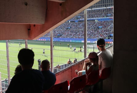 Fans watch the match through a fence in the stands during a Quarter Final match between Germany and Sweden at Roazhon Park.