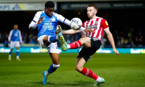 Rhys Norrington-Davies (right) in action during Sheffield United’s Championship win at Peterborough. 