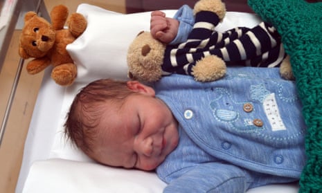Police release photos of baby found on east London doorstep | London | The Guardian