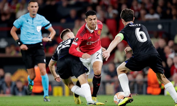 Cristiano Ronaldo is brought down during Manchester United’s home defeat