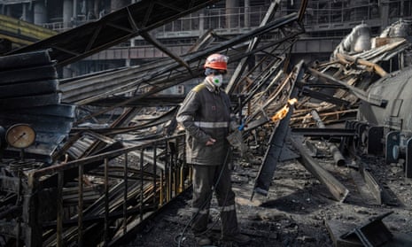 A worker, photographed on 2 April 2024, clears the rubble at DTEK’s power plant in Ukraine after it was hit by a Russian missile.