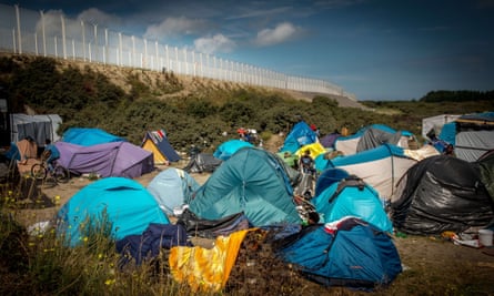 A migrant camp called New Jungle next to the fence of the ferry port in Calais, northern France