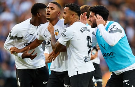 Samuel Lino is mobbed by his Valencia teammates