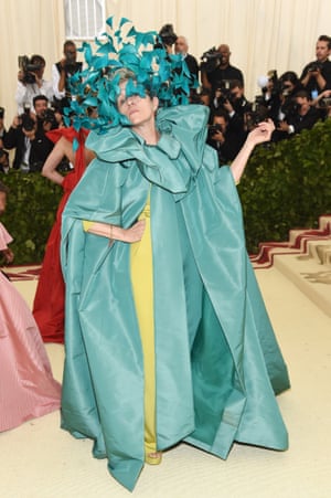 Leave it to Oscar-winning actor Frances McDormand to steal the show, with an enormous blue headpiece designed by Philip Treacy for Valentino Haute Couture. Her sumptuous turquoise cape and chartreuse gown ensemble is also by the Italian fashion house.