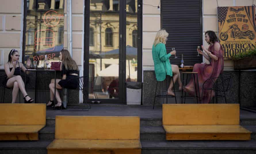 Women drink in a bar in Kiev, Ukraine