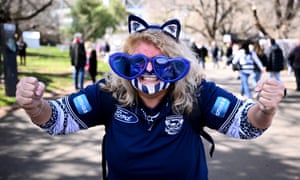 A Geelong Cats supporter outside prior to the start.