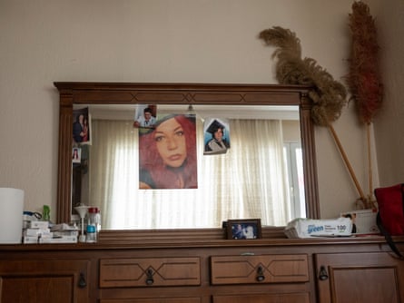 A photo of Şebnem Köker, who fell to her death from a hotel room, on the mirror in the living room of the Köker family home in İzmir, Turkey