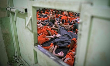 Men suspected of being affiliated with IS in a prison cell in Hasakeh in 2019.