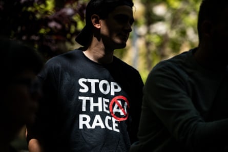 A demonstrator wearing a ‘Stop The AI Race’ T-shirt outside the federal court in Oakland, California.